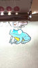 Video of frog being embroidered on an embroidery machine.
